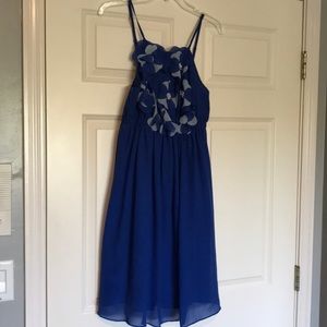 Royal blue with pearls and flowers.